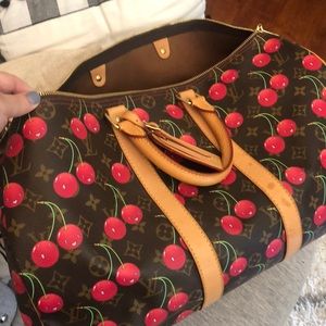 Small Louis Vuitton duffel bag